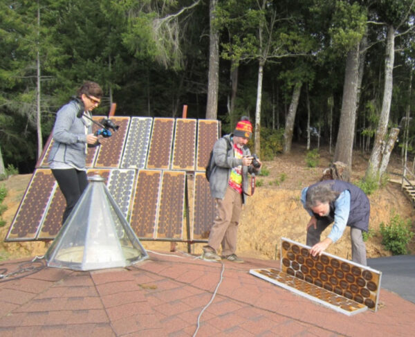 The first film trip for the Solar Roots documentary shows Jason filming David Katz examining an old Hoxan module (made in Japan). This early 80s module was simply laid on the roof with only gravity holding it down. It stayed there (with one re-roof) until it was decommissioned in 2016.