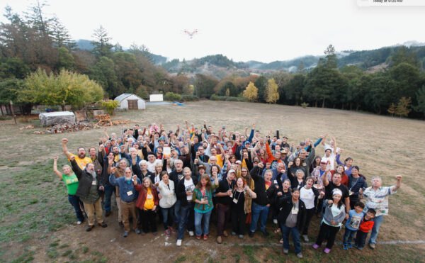 The Solar Pioneers group gathered in a field
