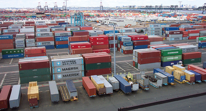 Shipping containers stacked in a shipping yard