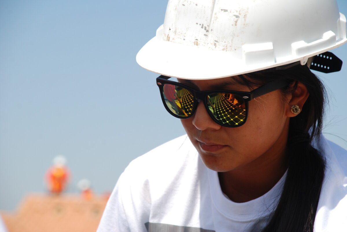 A GRID Alternatives volunteer works to install solar in the Inland Empire of California. Photo by Kate Costa.