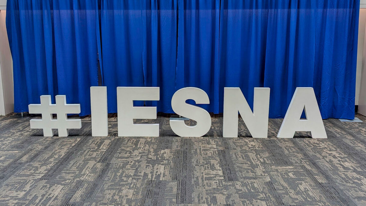 A large "hashtag IESNA" sign in the lobby of the San Diego Convention Center