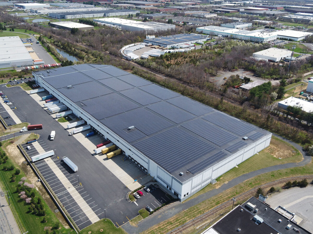 A large-scale rooftop solar array on a commercial buidling