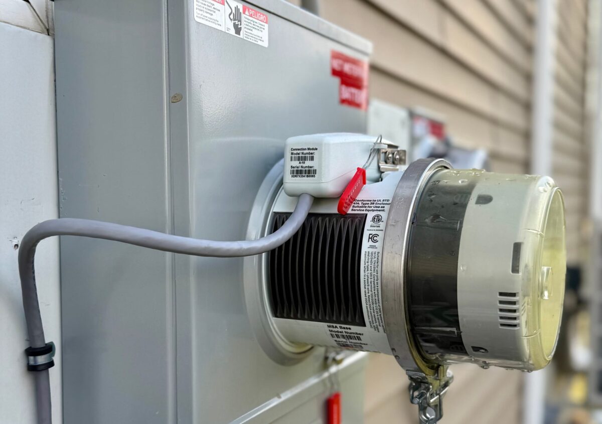 Close-up of a ConnectDER meter socket adapter