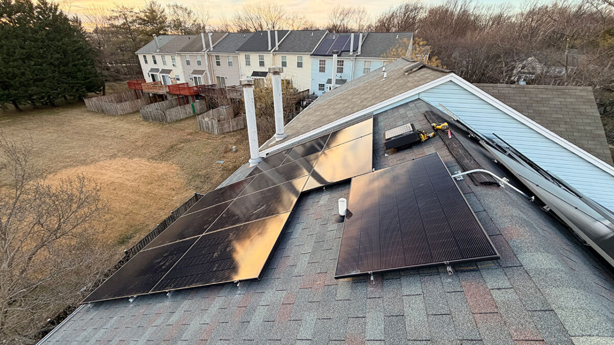 A rooftop solar installation on a Housing Unlimited townhome