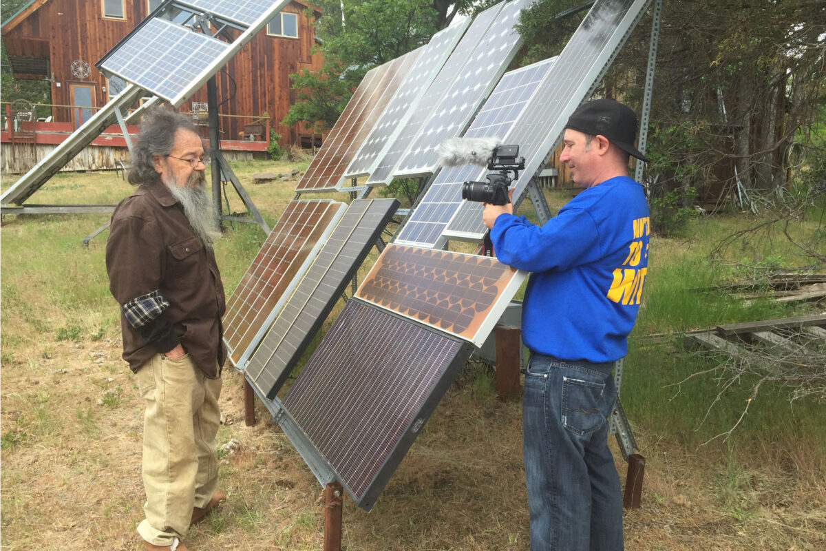 Richard Perez, founder of Home Power Magazine, showing of his “democracy” array to Jason Vetterli during the filming of the Solar Roots documentary.