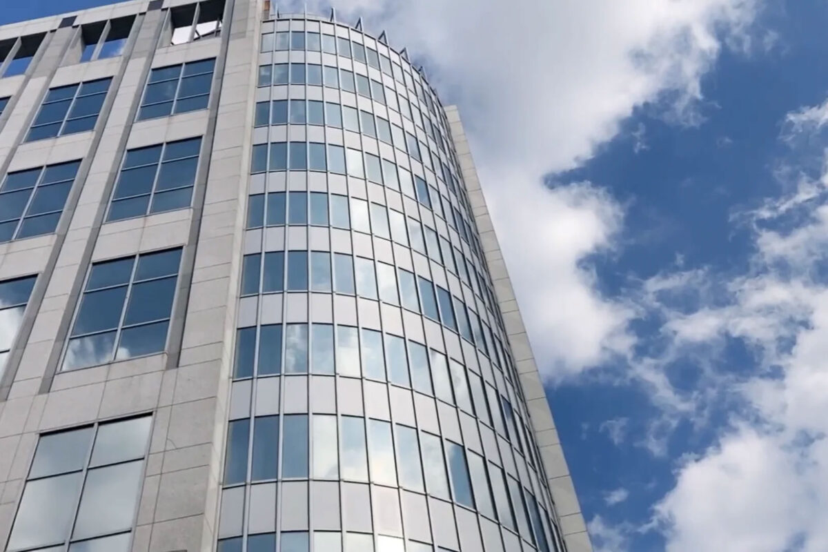 The Virginia SCC building against a blue sky